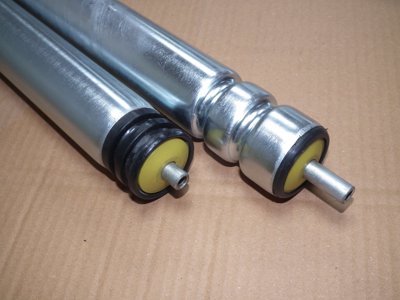 grooved rollers, O-ring driven rollers, precision machined rollers, polyurethane belt rollers